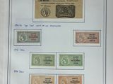 une image représentant une photo d'un ensemble de timbres posés sur une feuille de papier