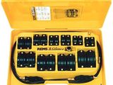 a close up of a yellow box with a bunch of black and white dice
