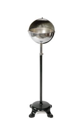 an image of a metal ball on a stand with a white background