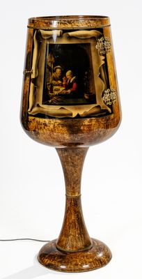 a wooden table lamp that has a picture on it