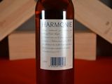 a bottle of wine that is sitting on a table