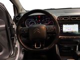 the interior of a car with a steering wheel, dashboard, and dash board