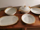 a table with a lot of plates and bowls on it