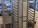 an image of a commercial kitchen with stainless steel racks