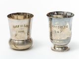 pair of silver goblets with engraved names on each of them