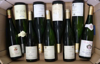 many bottles of wine in a box on the table