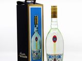 a bottle of vodka next to a box on a white surface