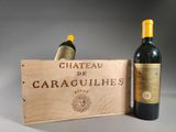 a wooden box with two bottles of wine in it