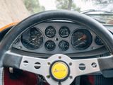 dashboard of a car with a steering wheel and gauges on it