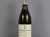 a bottle of wine that is sitting on a table