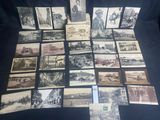several old black and white photographs of people and buildings on a table