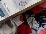 a box full of clothes sitting on top of a table