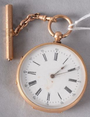 a gold pocket watch with a chain attached to it