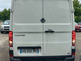 a white van that is parked in a parking lot