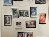 an image of a picture of a collection of stamps on a wall