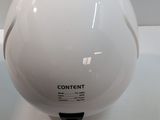 a white helmet sitting on top of a white table