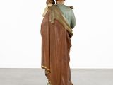 statue of a man holding a child in his arms