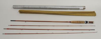 several different types of fishing rods and a fishing rod on a table