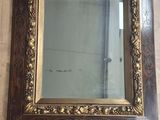 a picture of a mirror on the floor in a room