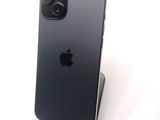 an image of a black iphone sitting on top of a white table