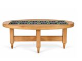 an image of a wooden table with a blue and green design on it