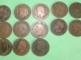 a close up of a bunch of coins on a green surface