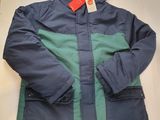 the jacket is blue and green and has a hood on it