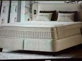 a picture of a bed with pillows and pillows on it
