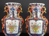 paire de vases chinois ornés de fleurs et d'oiseaux sur fond noir