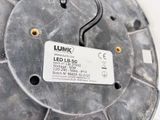 a close up of a metal object with a label on it