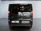 a black van that is parked in a garage