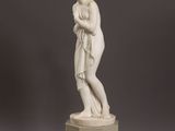 an image of a statue of a man holding a child