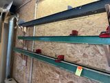 two shelves that have some tools on them in a room