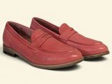 pink leather loafers with a rubber sole and a rubber outs