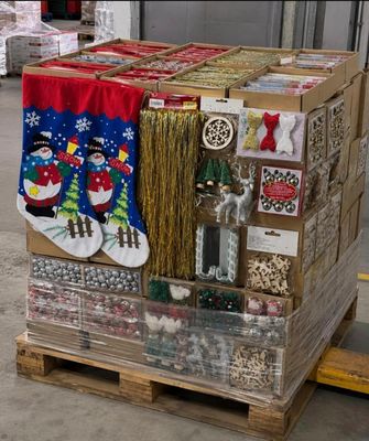 a pallet with a bunch of christmas decorations on it