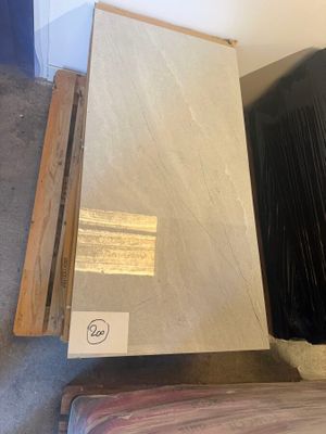 a pile of marble slabs on the floor in a room