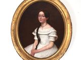portrait of a young woman in a white dress in a gold frame