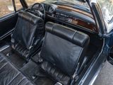 a black car with leather seats in the back of it