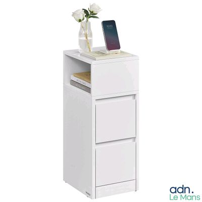 une armoire blanche sur laquelle est posé un téléphone