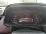the dashboard of a car with a digital display on it