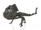 an image of a bronze sculpture of a frog on a white background