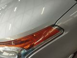 a close up of a car ' s headlight and tail light