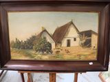 a picture of a painting of a farm scene on a easel