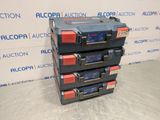 a stack of four batteries sitting on top of each other