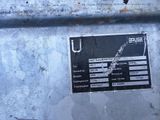 a sign on the side of a metal container
