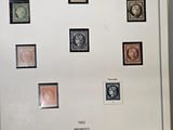 a picture of a refrigerator with a lot of stamps on it
