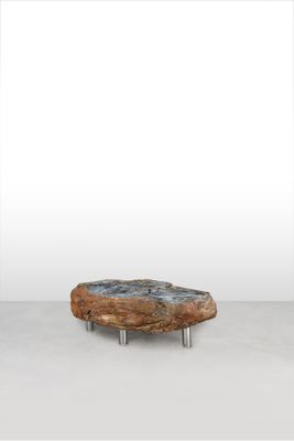 a close up of a piece of wood sitting on top of a table