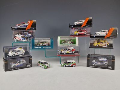 many different models of cars in a display case
