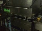 an image of a commercial kitchen with a lot of appliances