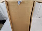 a cardboard box sitting on top of a white sheet